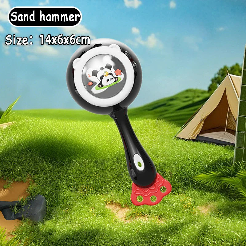 Montessori music instruments toy featuring a black and red plastic sand hammer with a white panda face design