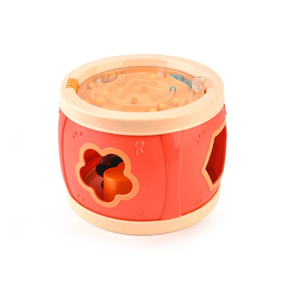 Bright red and beige plastic montessori musical drums set percussion with shape-sorting openings for baby musical instrument learning