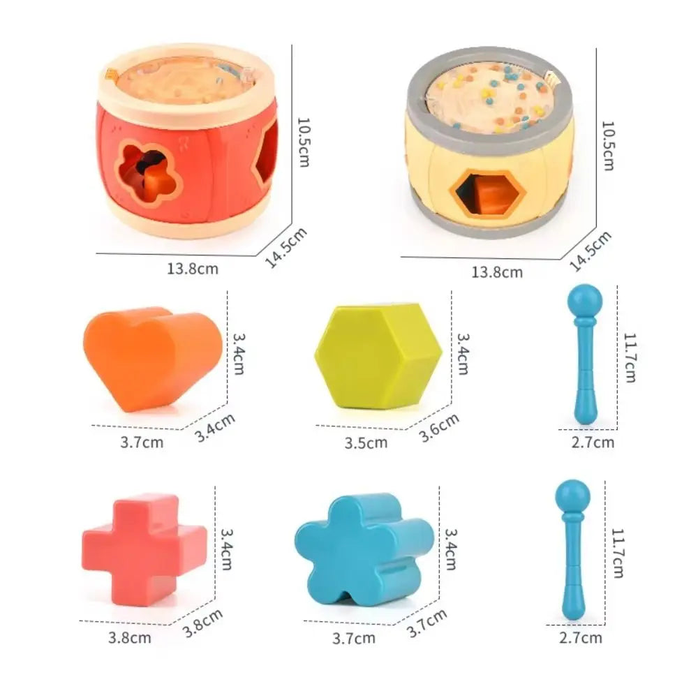 Red wooden montessori musical drums set percussion shape sorter with colorful geometric cutouts and orange heart block
