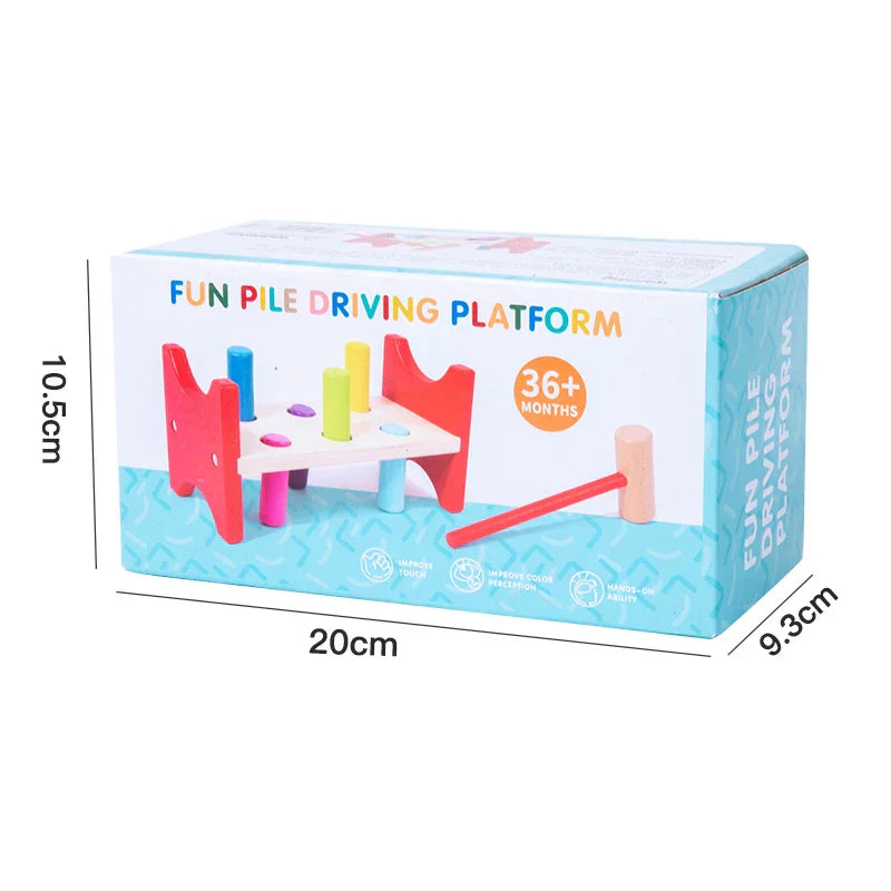 Montessori-style early learning percussion table with colorful wooden pegs and red supports in a light blue box hammer toy educational instrument