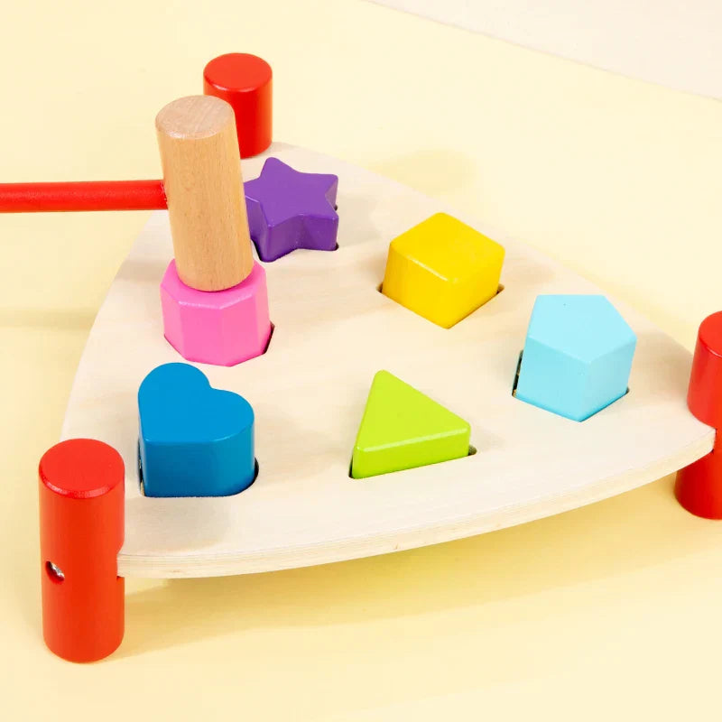 Montessori-style early learning percussion table with colorful wooden blocks and light wood base hammer toy educational instrument