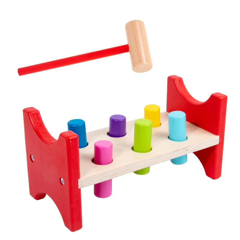 Red wooden hammer toy with colorful cylindrical pegs for early learning percussion and educational musical instrument play
