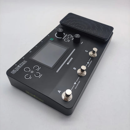 Black Mooer ge100 pro ii guitar effects pedal with touchscreen, three footswitches, two knobs, and textured footpad for performances