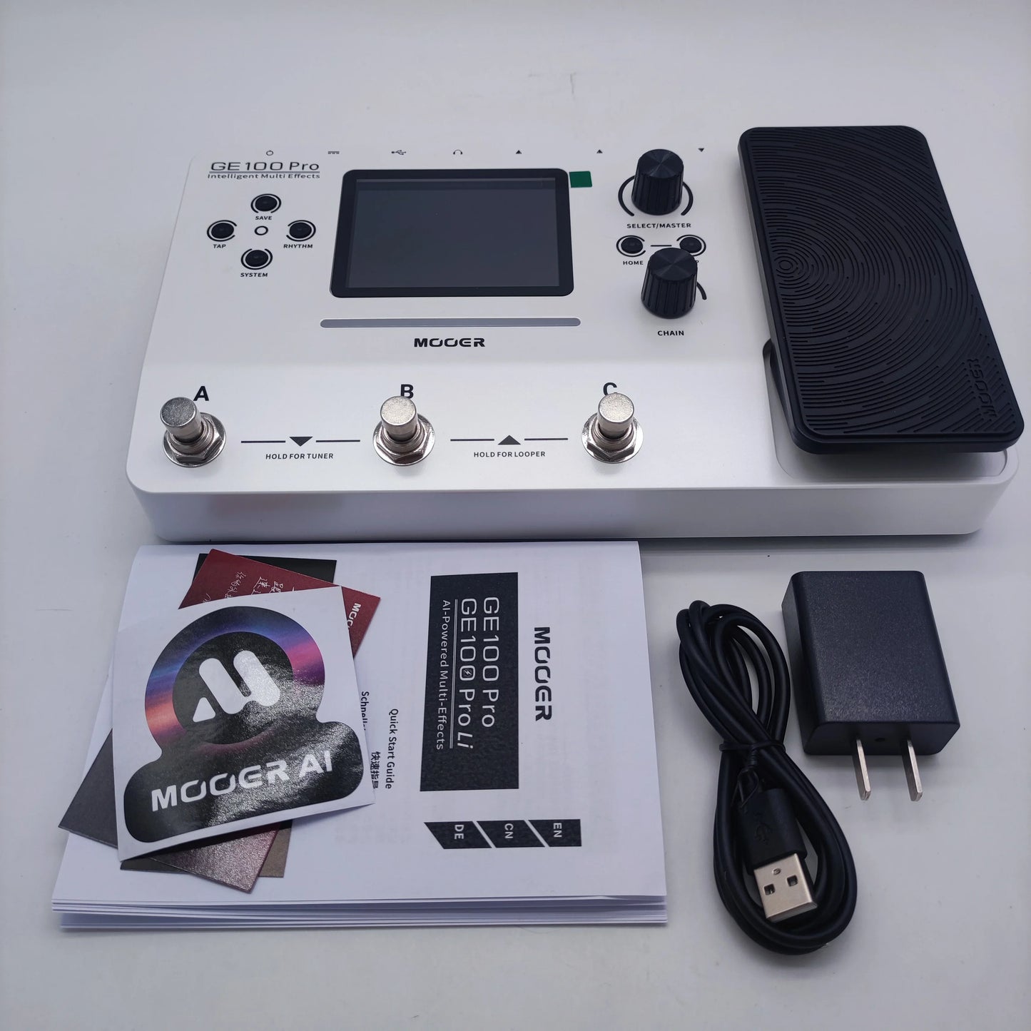 White mooer ge100 pro intelligent multi effects pedal with black footswitch silver knobs and 50 tone banks for performances