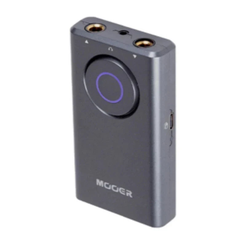 Gray metallic mooer prime p1 guitar pedal with purple-lit button and gold headphone jacks for drum machine and bass guitar