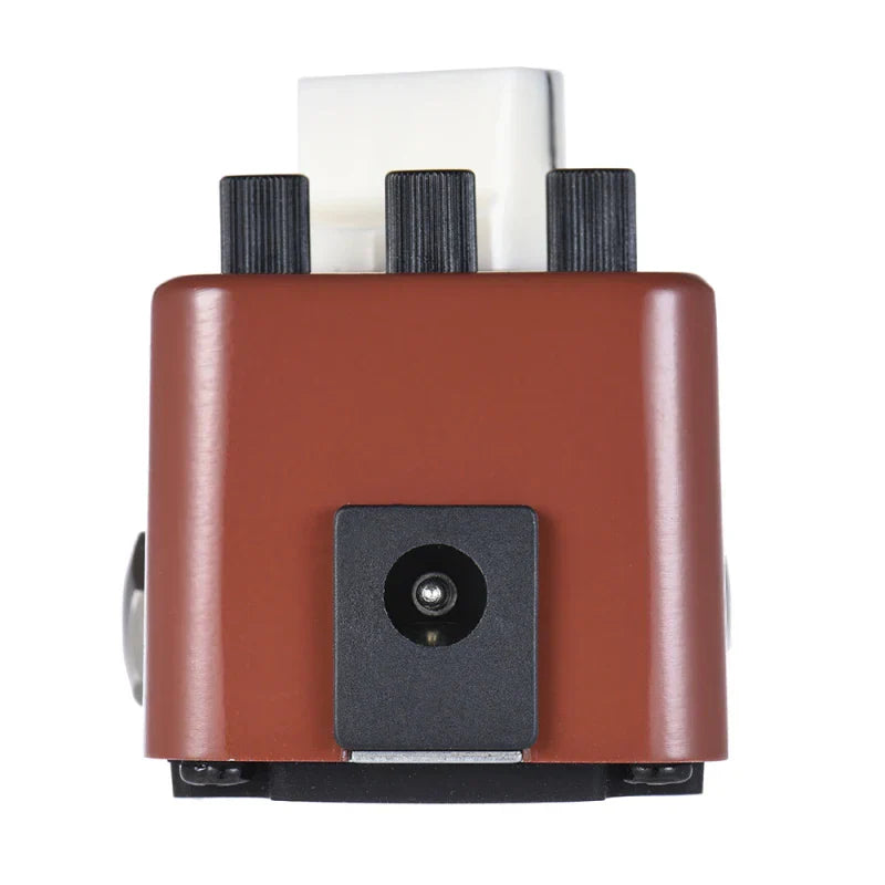 Brown mooer pure octave mini octave guitar pedal with three black knobs white input jack full metal shell design