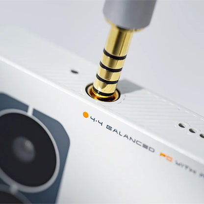 White moondrop miad01 5g mobile audio device music player with gold 4.4mm balanced jack and gray speaker grille design