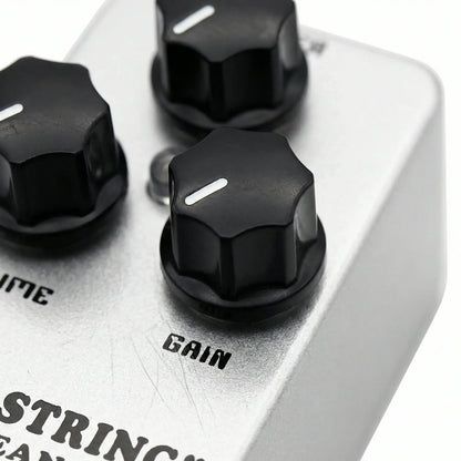 Silver metal mosky electric guitar overdrive pedal with three black hexagonal knobs for clean drive metal tone control