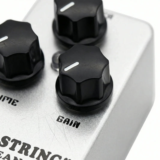 Silver metal mosky mini string clean drive overdrive guitar pedal with three black hexagonal knobs and white indicators