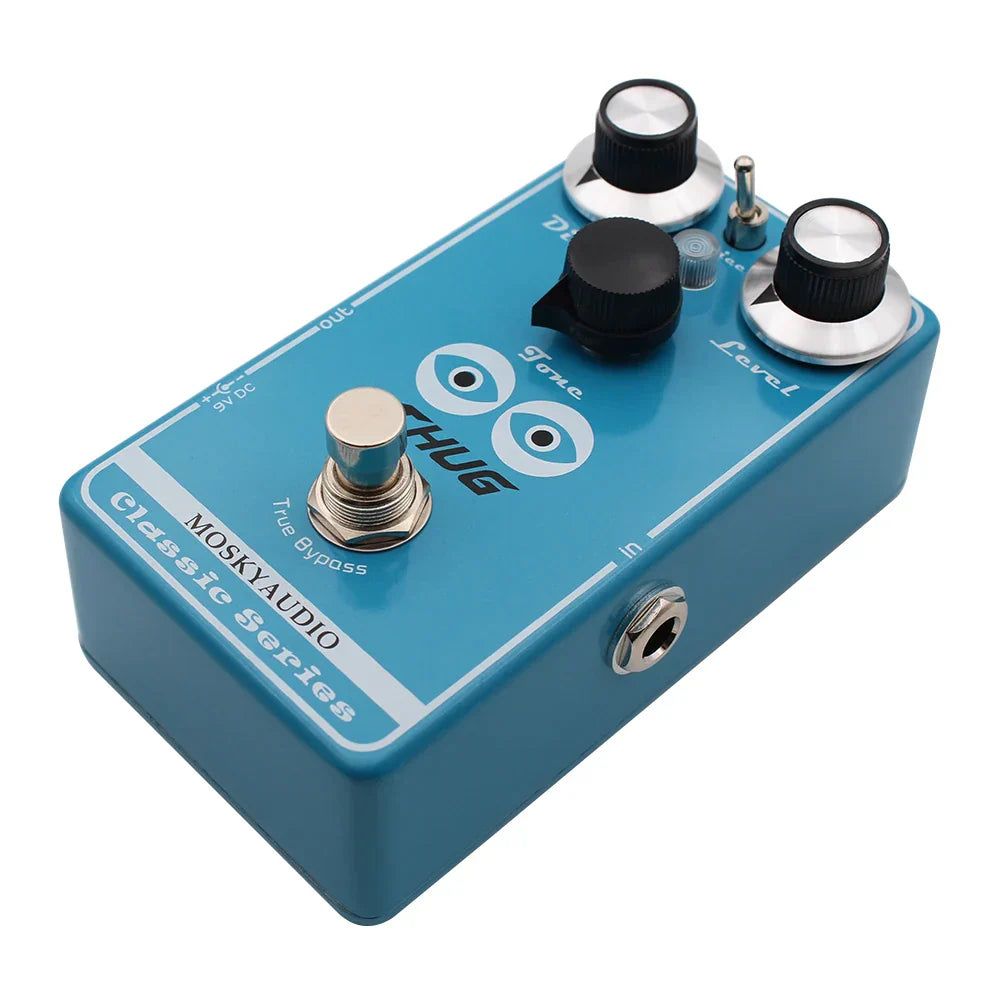 Blue mosky thug distortion guitar pedal with adjustable dist level black silver knobs and eye graphics design