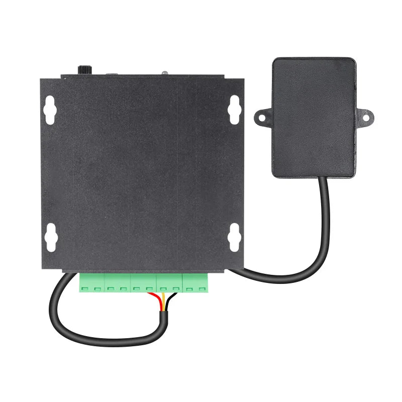 Black rectangular electronic control unit with green terminal block and cable for touch-free sensor audio playback in playgrounds