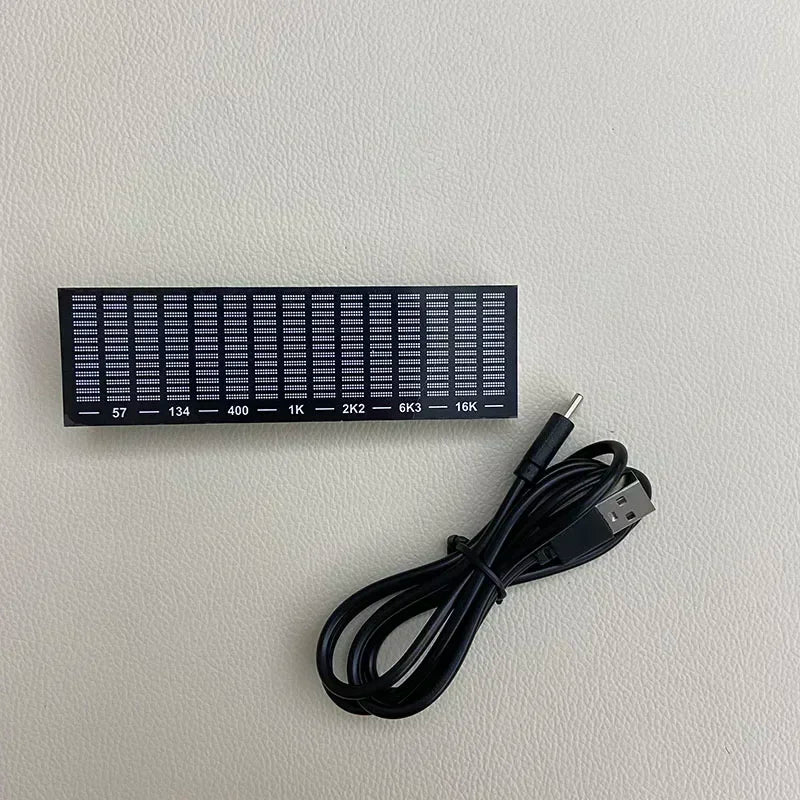 Black rectangular multi-mode led level indicator with resistor grid and usb cable for music spectrum display and audio rhythm lamp