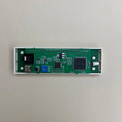 Green circuit board with white casing featuring usb port and components for multi-mode led level indicator audio rhythm lamp