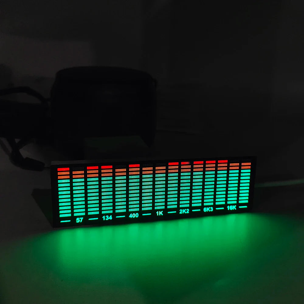A rectangular led audio level meter with red and green bars displaying 57 to 16k frequency for voice control music spectrum atmosphere light