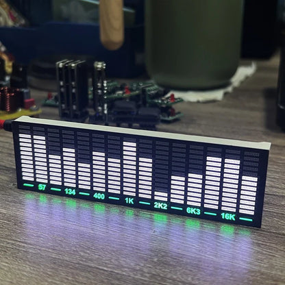 Black rectangular led audio level indicator vu meter with white bars and green frequency labels for voice control music spectrum atmosphere light