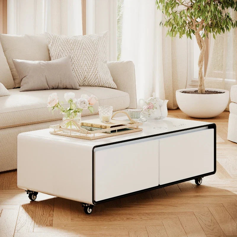 White leather multifunctional smart coffee table with black trim caster wheels and refrigerator smart furniture features