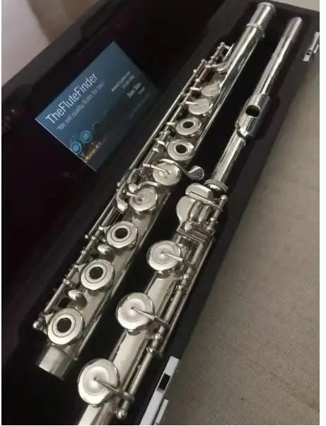 Two silver plated muramatsu flute-b foot instruments with intricate keys in a black case musical instrument copper-l