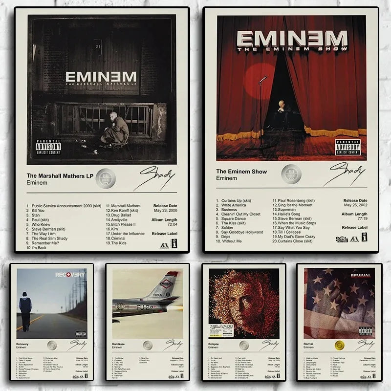 Set of five framed eminem album posters with black and white and color artwork tracklists and parental advisory labels