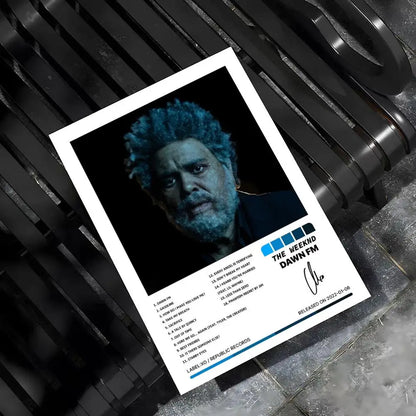 White-framed weeknd hip hop poster with blue-toned dawn fm portrait and black tracklist for bar home decor wall art
