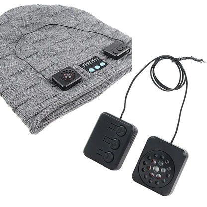 Gray knitted beanie with black wireless stereo bluetooth hat speakers and movement module headphones for unique tech caps