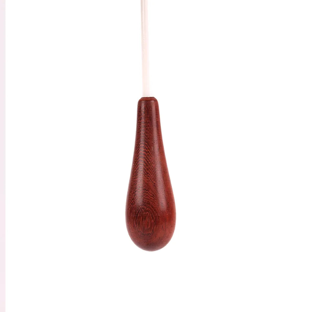 A polished reddish-brown concert conducting rosewood baton 38.3cm music wand orchestra stick with teardrop handle
