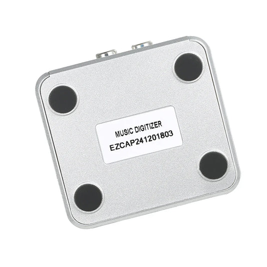 Silver rectangular music digitizer with mini usb port and remote control for recording and playback of analog music