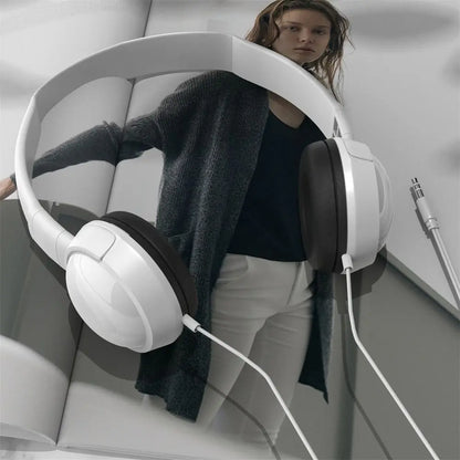 White over-ear music earbuds headset adjustable audio with black earcups and macaron headphone tablet design