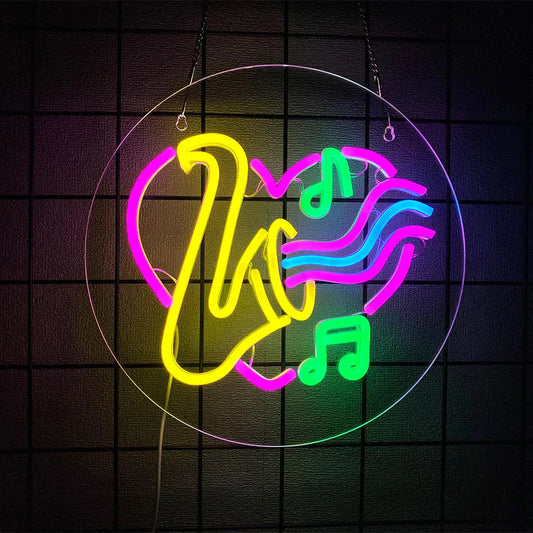 A usb powered neon sign with vibrant yellow, pink, blue, and green musical notes for music studio decor