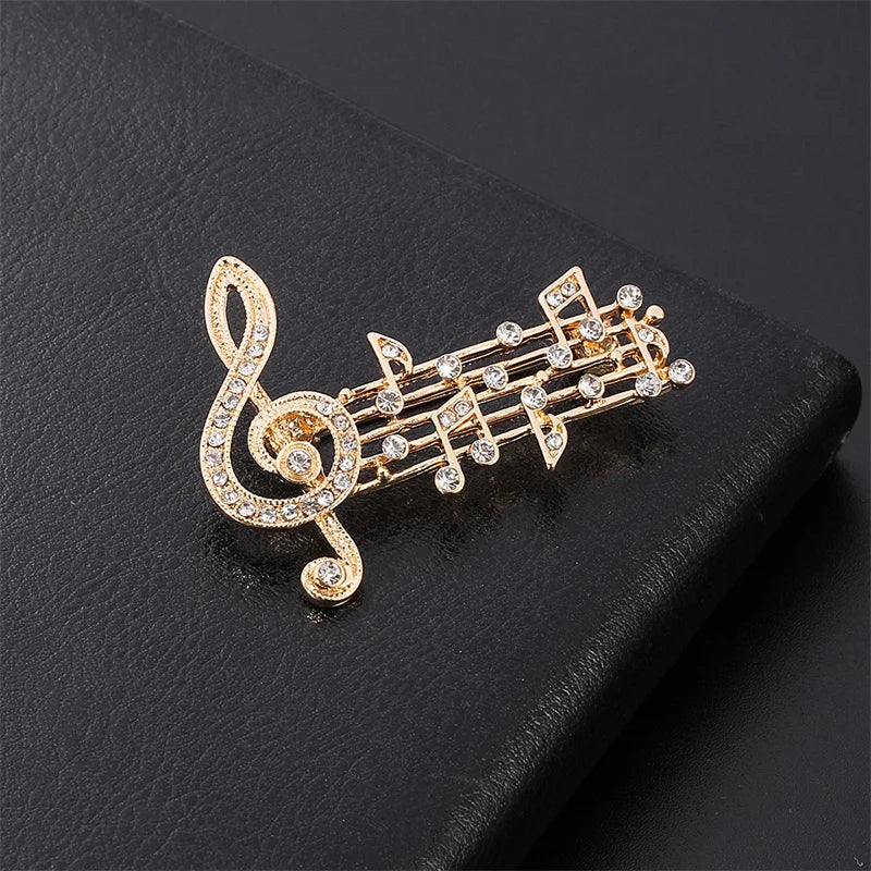 Gold-colored note large brooch adorned with sparkling austrian crystal for jewelry party dress and scarf decoration