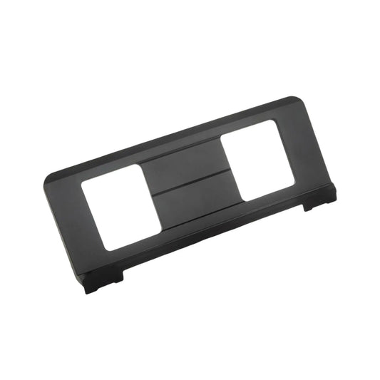 Black plastic vhs tape case holder with two rectangular cutouts and central groove for music score stand keyboard use