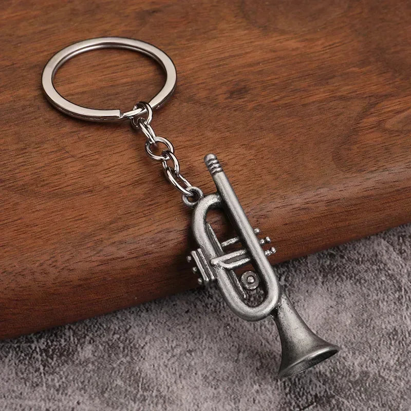 Silver-toned retro musical instrument metal keychain pendant with detailed valves for small gift men and women keyrings mini