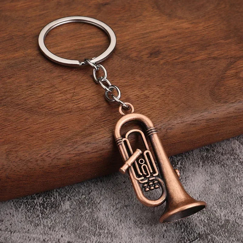 Bronze-colored brass tuba-shaped retro musical instrument metal keychain with silver ring for small gift men women keyrings mini