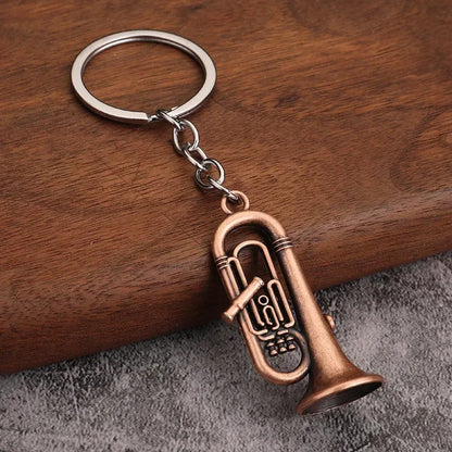Bronze-colored brass tuba-shaped retro musical instrument metal keychain with silver ring for small gift men women keyrings mini