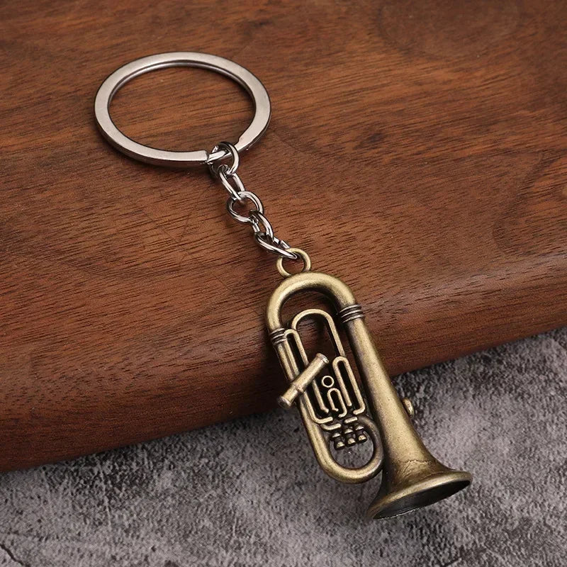 Antique brass-colored tuba-shaped metal keychain with silver ring retro musical instrument for small gift men and women keyrings mini