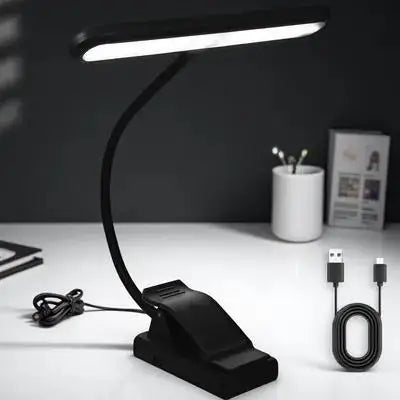 Black adjustable led piano lamp with sleek curved arm and clip base usb rechargeable music stand light for reading