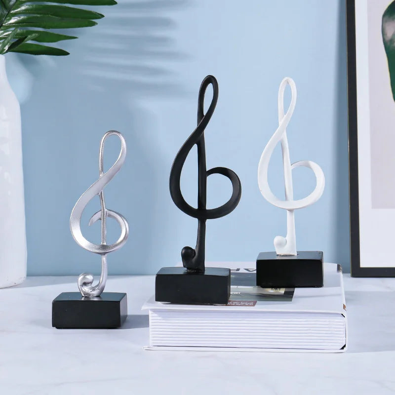 Three sleek music symbols resin treble clef crafts ornaments piano statues in silver black and white for room decor