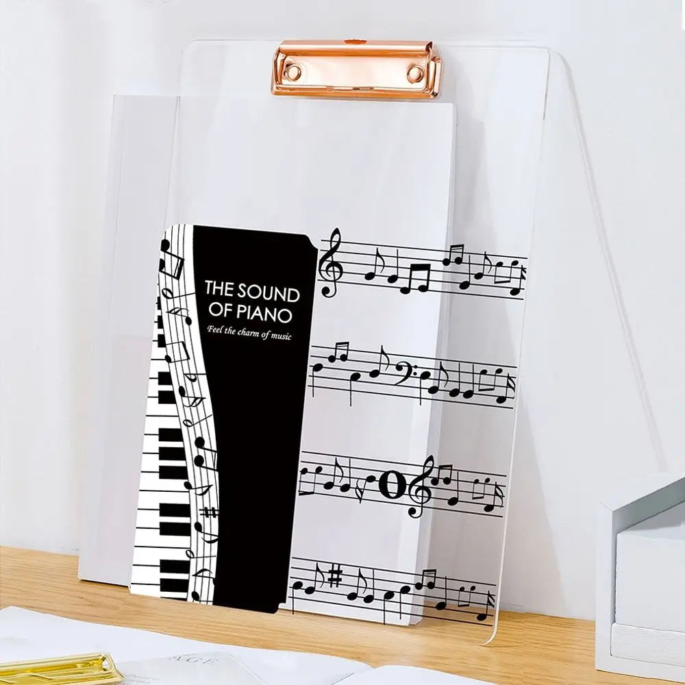 Clear acrylic clipboard with rose gold clip holding piano-themed notebook is a thickened a4 file folder portable creative document holder
