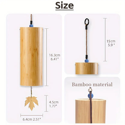 A natural bamboo wind handbells with cylindrical body, blue bead accents, and leaf pendant for refined meditation bells