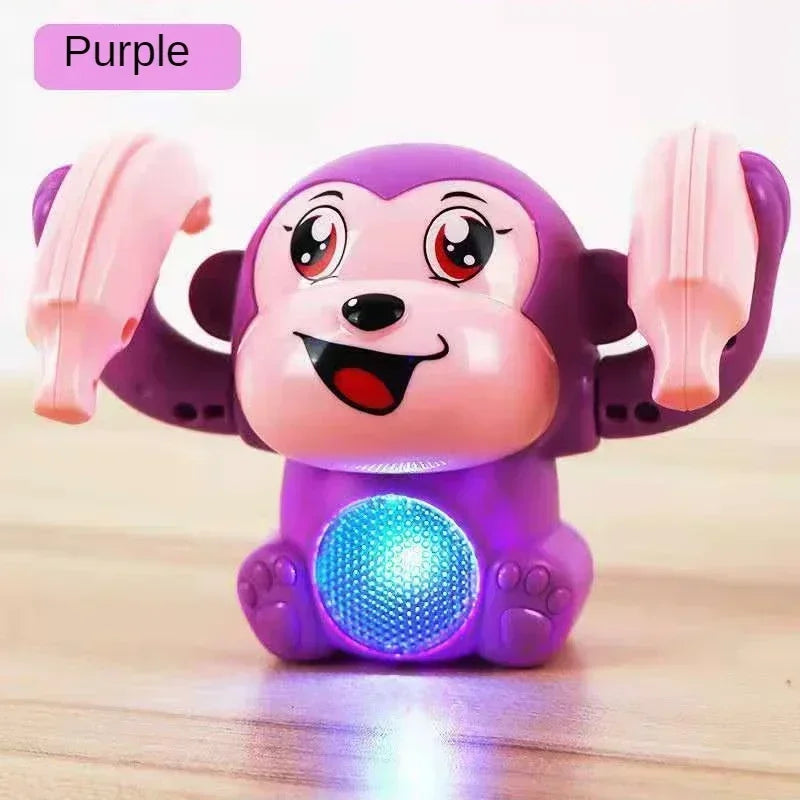 Purple plastic musical crawling monkey toy with pink hands and glowing blue light for interactive light-up dancing tummy time gifts