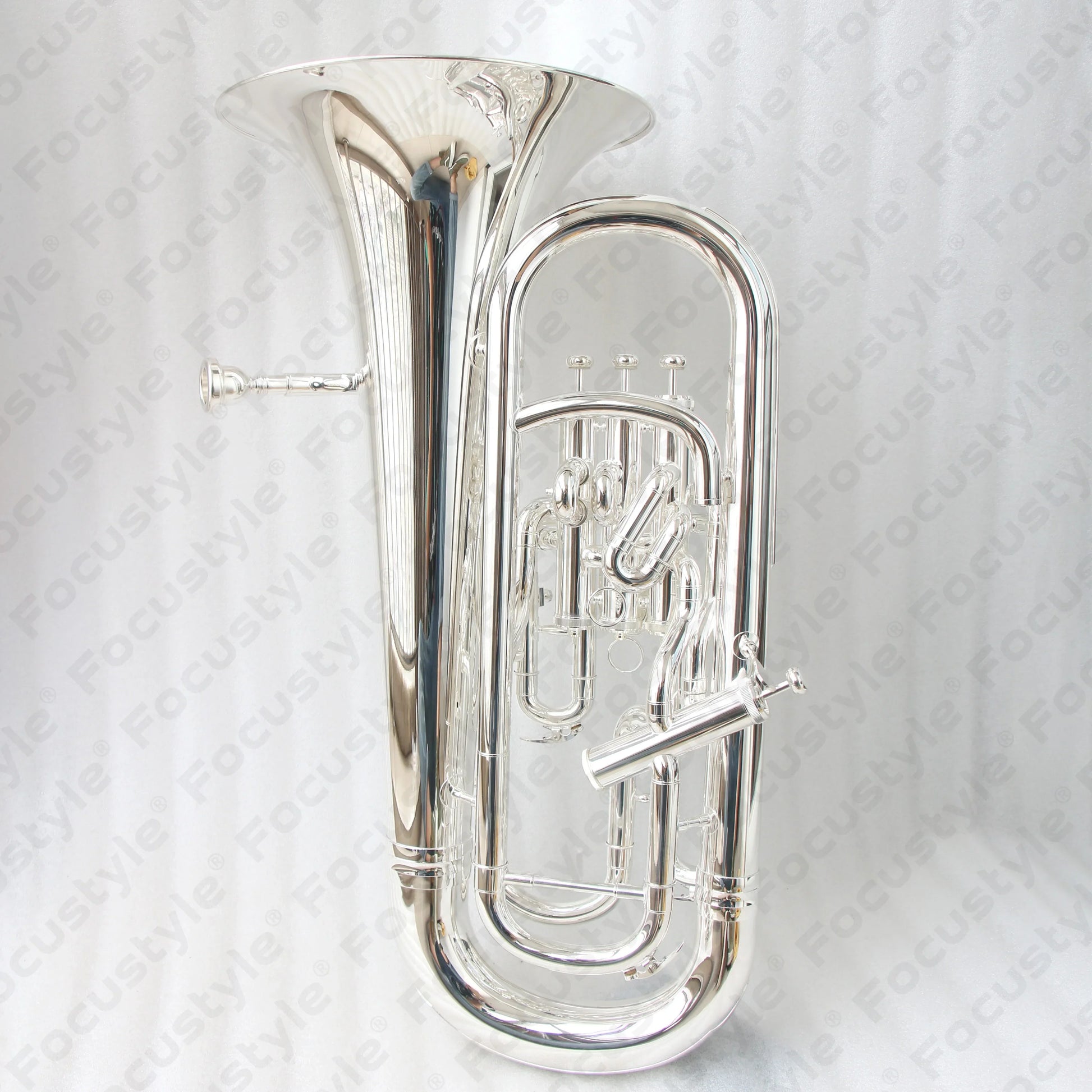 Shiny silver euphonium with polished brass finish and intricate 4 valve mechanisms designed for high quality sound