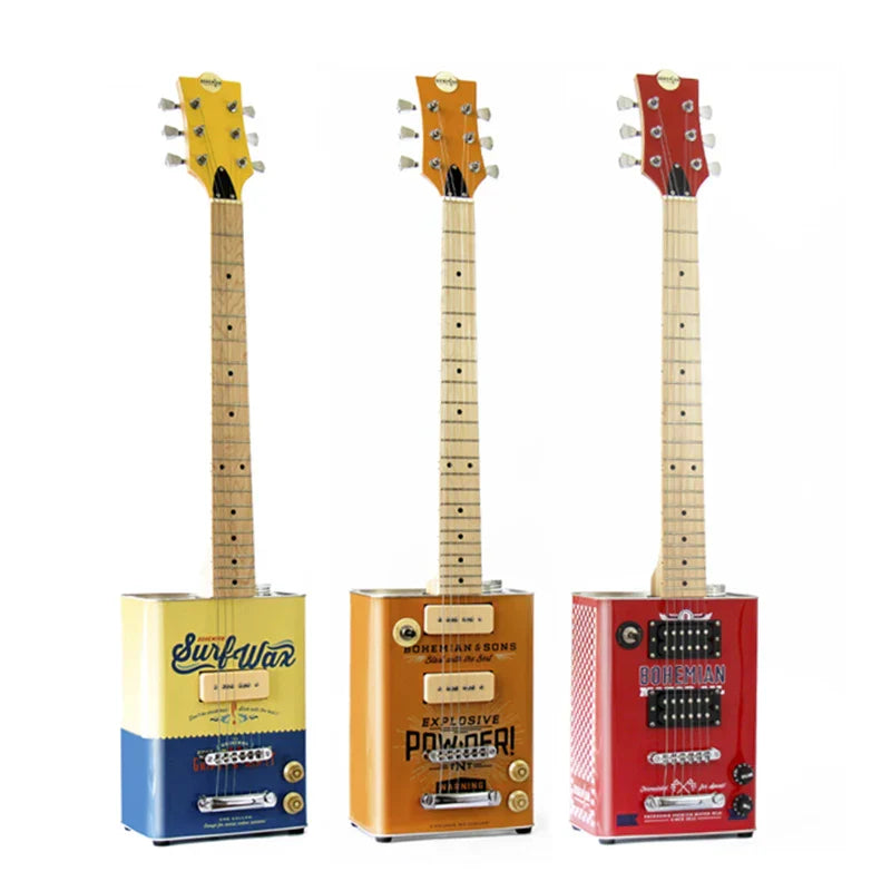 Three vintage guitar-shaped containers in yellow-blue, orange-black, and red-white designs for musical instrument guitar use
