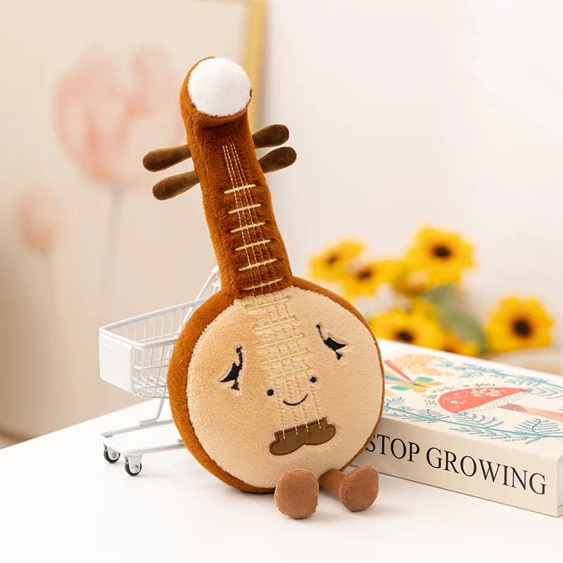 Brown plush toy from musical instrument series shaped like a lute with embroidered face and soft feet for gift use