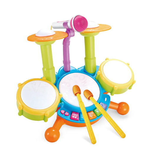 Brightly colored plastic musical instruments children jazz electric light cool drum set with pink microphone and yellow sticks