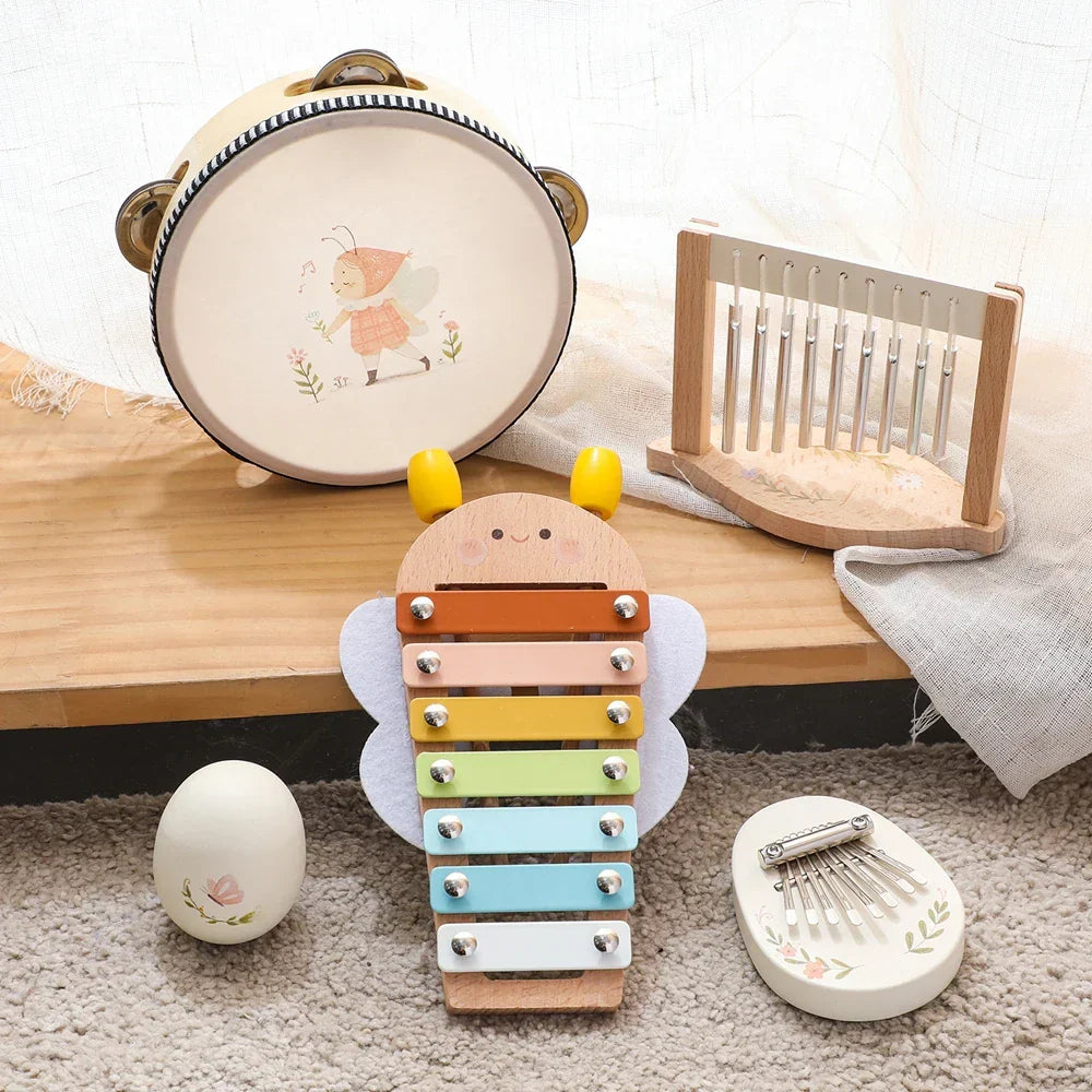 A charming wooden bee-shaped toys drum xylophone with rainbow keys for early educational wooden musical instruments montessori