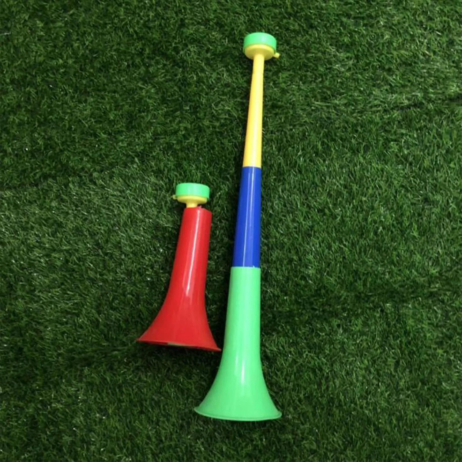 Two colorful plastic cheer fan horns in red and yellow-blue-green gradient for removable football stadium use