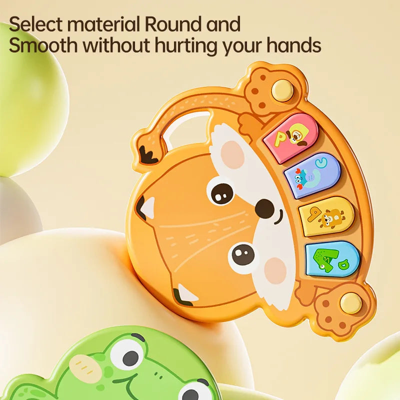 Orange fox-shaped kids electronic piano toy with colorful button keys and soft rounded edges for piano toy learning