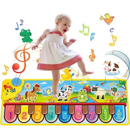 A colorful cartoon-themed musical play mat with a floor piano keyboard and carpet animal blanket design