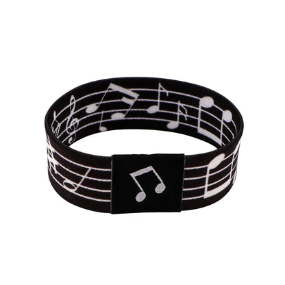 Black rubber musical notes bracelet with white staff lines and a black clasp for men armband sport or rainbow elastic bangle use