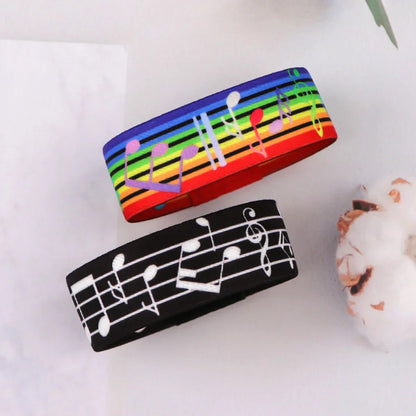 Rainbow elastic bangle and black musical notes bracelet featuring colorful notes and white sheet music for men armband sport