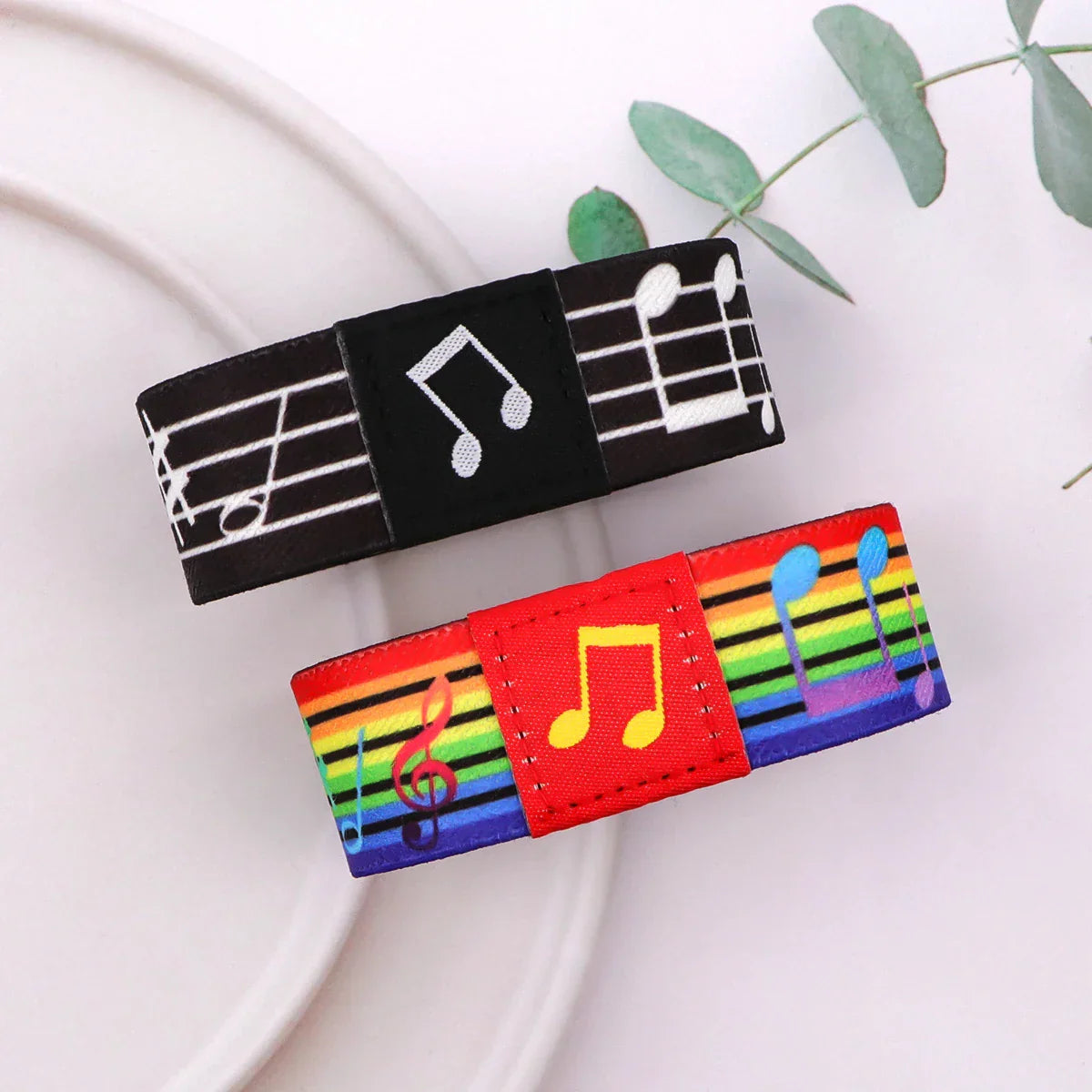 Two colorful musical notes bracelets with black and rainbow elastic bangle designs for men armband sport use